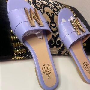 Purple and Gold Flats with Decorative Emblem